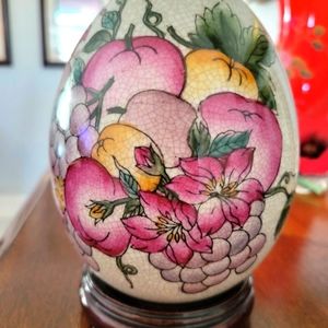 VINTAGE PORCELAIN EGG WITH STAND.